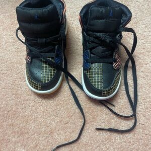 Jordan Black and Blue High-Top Sneakers